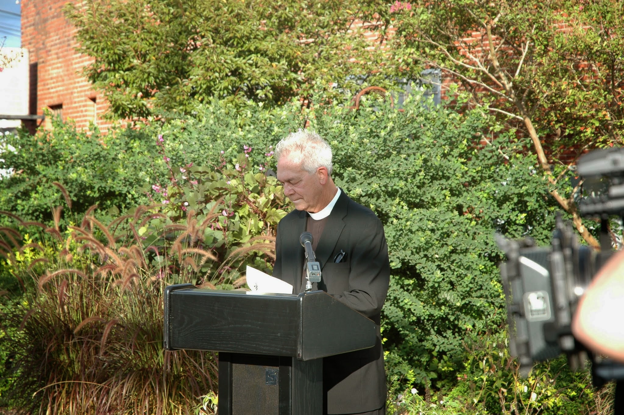 The reverend giving his invocation at the unveiling