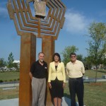 Alex Palkovich with South Carolina Governor Nikki Haley, and Barry Wingard, standing in front of the 9/11 monument he designed